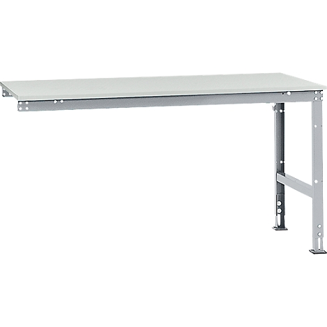 Workbench with gray metal frame and white top. One side is attached to the wall, the other stands on two legs.