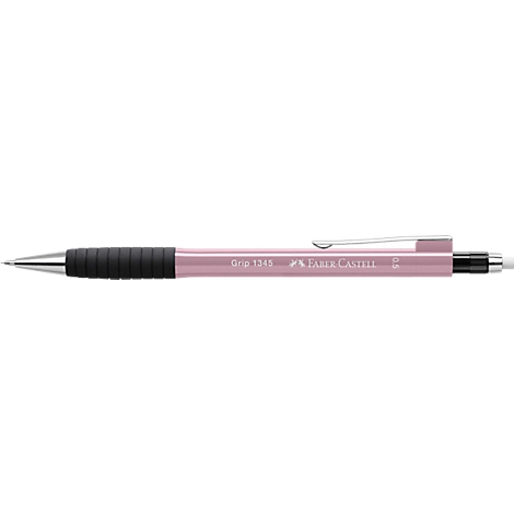 Pink Faber-Castell ballpoint pen with black grip. "Grip 1353" is written on the pen.