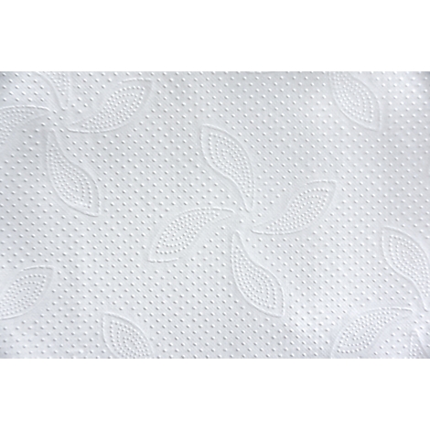 Nahaufnahme eines weißen Papiertuchs mit geprägten floralen Mustern und winzigen Punkten.
