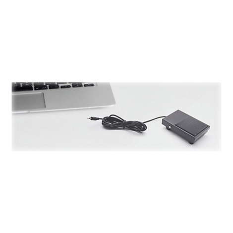 Ein schwarzes FuÃŸpedal mit Kabel liegt neben einem Laptop.