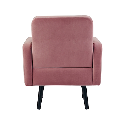 Vue arrière d'un fauteuil en velours rose avec des pieds noirs.