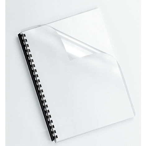 A white notebook with a black spiral binding, the cover sheets are partially unfolded.