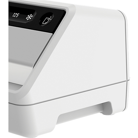 Close-up of a white electronic device with black control panels. Numbers and symbols are visible on the buttons.