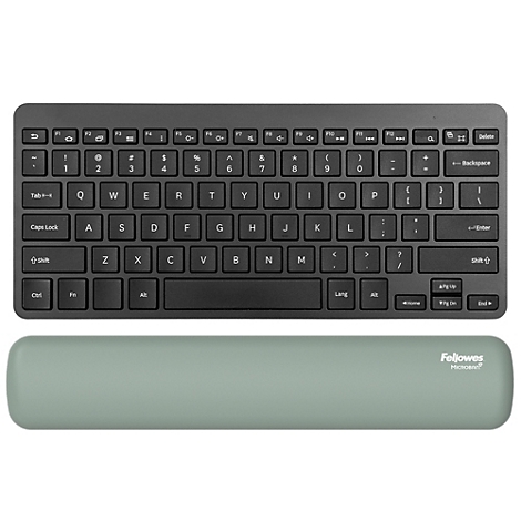 Draufsicht auf eine schwarze Tastatur und eine grüne Handgelenkauflage. Auf der Auflage steht 'Fellowes'.