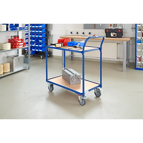 Blue and silver workshop trolley with tools and a toolbox. Shelves and workbench in the background.