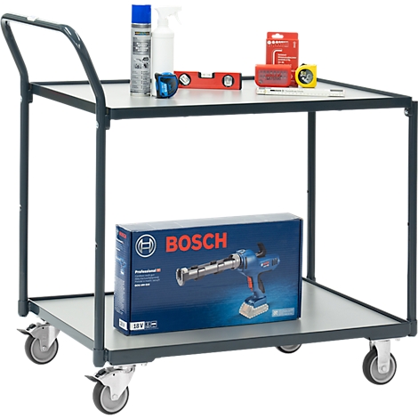 Chariot à outils avec outils. Haut : spray, niveau, angle. Bas : outil Bosch dans une boîte.