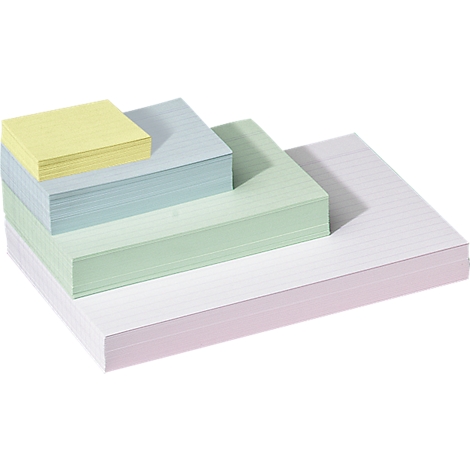 Montones de papel rayado en varios colores.