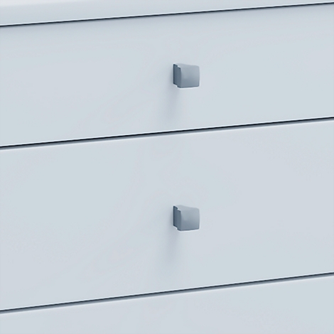 Close-up of two drawers with square, grey handles. The drawers are light blue.
