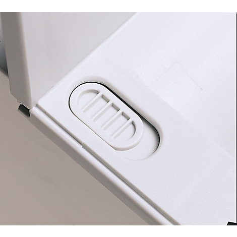 Detail of white plastic featuring an oval recessed element containing a slider with three horizontal bars.