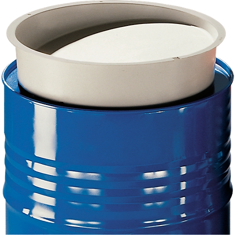Blue barrel with gray insert and white material inside. The insert sits on the barrel.