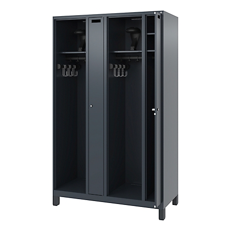 Dark grey locker with two doors, one open. Inside shelves, coat hooks, and two helmets. The cabinet stands on small feet.