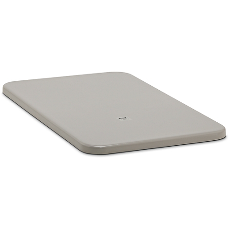 Gray, rectangular mat with rounded edges. A small, dark detail is in the middle.