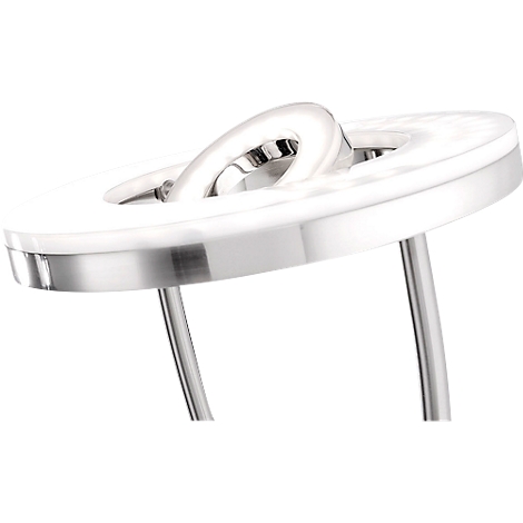 Close-up of a metallic ring with a curved element above it on two rods.