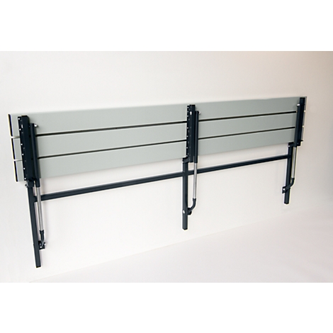 Gray wall bench against white background. Black metal frame. Folding mechanism.