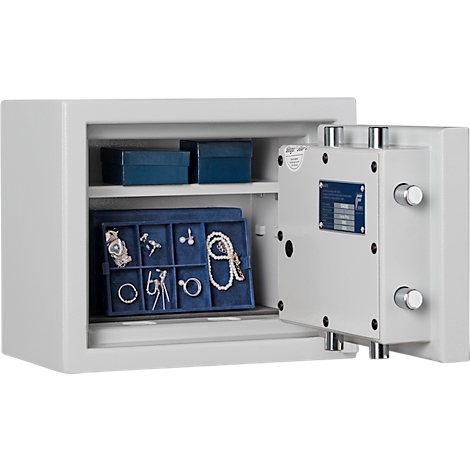 Open kluis met sieraden op blauw fluweel, blauwe dozen op de achtergrond.