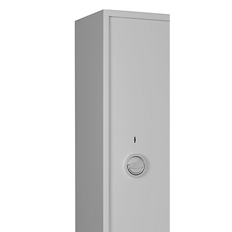 Close-up of a white safe with number wheel.