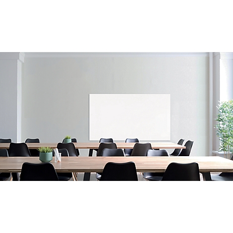 Conference room with tables, chairs, and a whiteboard. Green pot on the table. A window in the background.