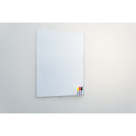 Whiteboard on a white wall. Colorful markers at the bottom right. For notes and presentations.