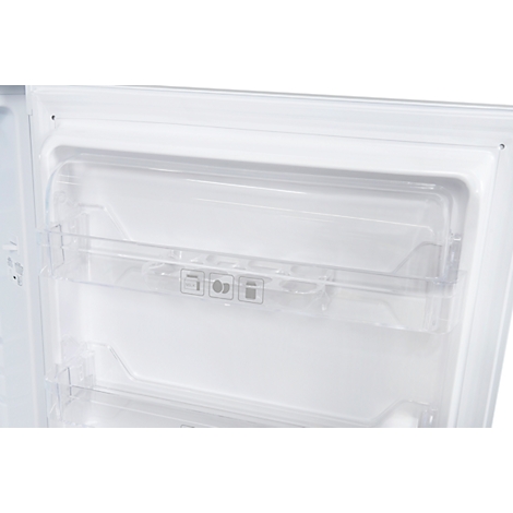 Close-up of a refrigerator interior with transparent shelves and symbols. View inside the fridge.