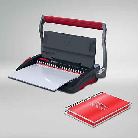 Een zwarte GBC-bindmachine met rode handgreep en een rood gebonden document met de tekst "ANNUAL REPORT".