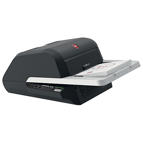 Un scanner de documents gris avec un plateau ouvert contenant un livre. L'appareil est photographié sur fond blanc.