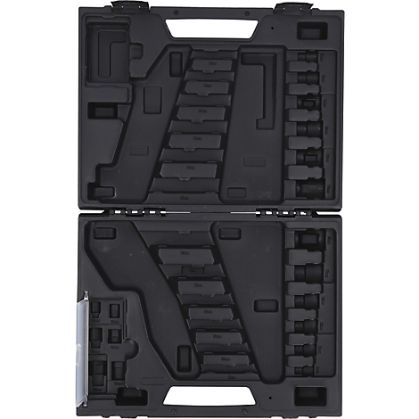 Offener Werkzeugkoffer mit schwarzem Innenleben, gefüllt mit verschiedenen Werkzeugen und Steckschlüsseln.