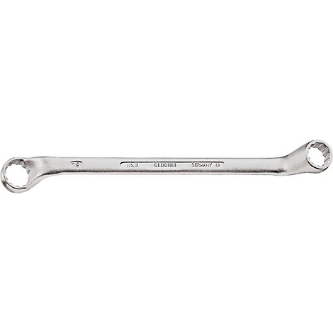 Ein metallischer Ringschlüssel, aus Stahl. Auf dem Schlüssel sind Schriftzüge eingraviert.