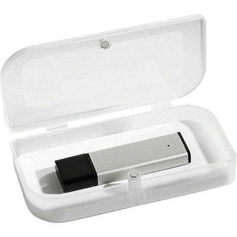 A silver USB stick lies in an open, white plastic box. The stick has a black cap.