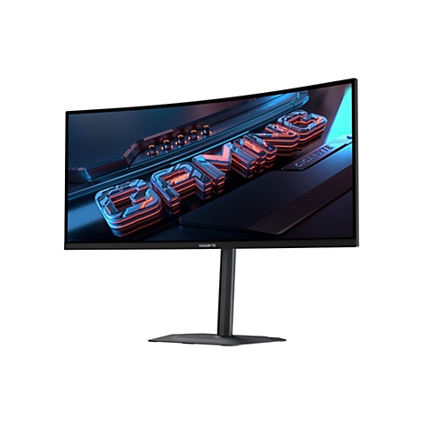 Ein Gaming Monitor mit Wortlaut GAMING. Gebogene Bildschirmfläche mit dunkelblauen und roten Details, auf einem weißen Hintergrund. Der Monitor ist auf einem schwarzen Ständer montiert.