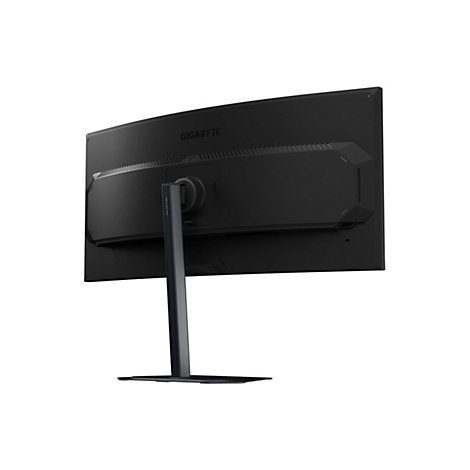 Schwarzer, gebogener Bildschirm, Rückansicht. "GIGABYTE" Schriftzug. Schwarzer Standfuß.