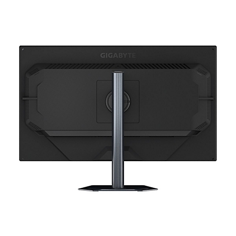 Rückseite eines schwarzen Gigabyte Monitors mit vertikalem Standfuß auf weißem Hintergrund.
