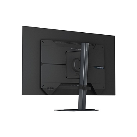 Rückseite eines schwarzen Gigabyte Gaming-Monitors auf einem Standfuß vor weißem Hintergrund.