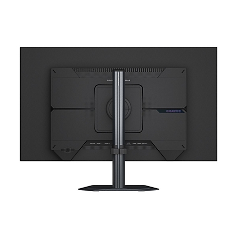 Rückseite eines schwarzen Gaming-Monitors mit Standfuß. Anschlüsse wie HDMI, USB und DC sind beschriftet. Der Monitor zeigt das Gigabyte-Logo.