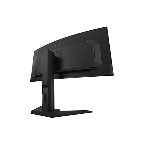 Moniteur de jeu noir vu de dos, logo du fabricant GIGABYTE reconnaissable. Le moniteur a un écran incurvé et un support.
