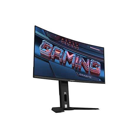Ein Gaming-Monitor mit gekrümmtem Bildschirm, der in einem Winkel vor weißem Hintergrund steht. Das Wort "GAMING" und das Gigabyte Logo sind zu sehen.