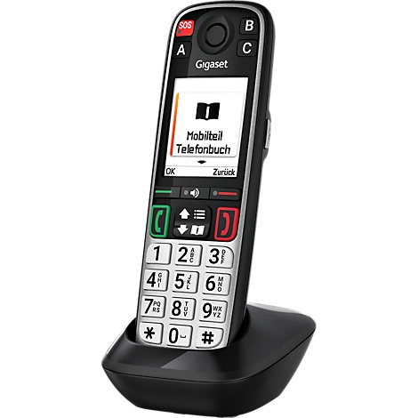 Schwarzes Gigaset Seniorenhandy mit großen Tasten in der Ladestation. Das Display zeigt 'Mobilteil Telefonbuch' an.