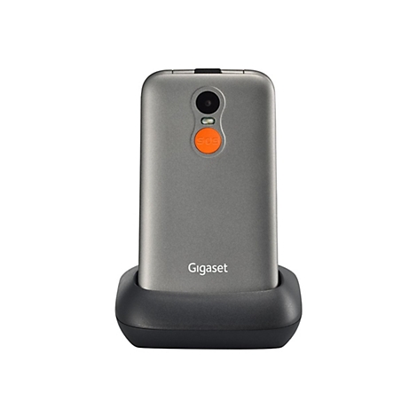 Graues Gigaset-Telefon, in Ladeschale, mit SOS-Taste. Logo unterhalb.