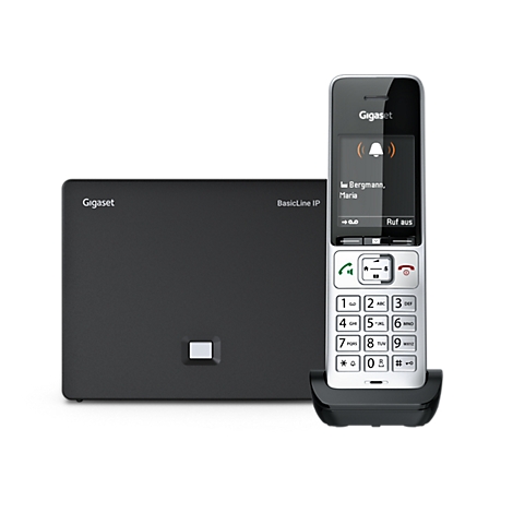Schwarze Gigaset Basisstation und silbernes DECT-Telefon mit beleuchtetem Display vor weißem Hintergrund.