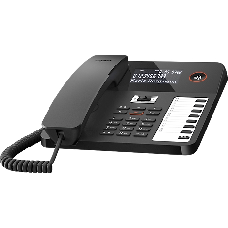 Téléphone fixe noir avec écran et boutons. L'écran affiche un numéro de téléphone et le nom Maria Bergmann.