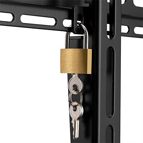 Gros plan : cadenas doré avec deux clés fixées sur un support en métal noir.