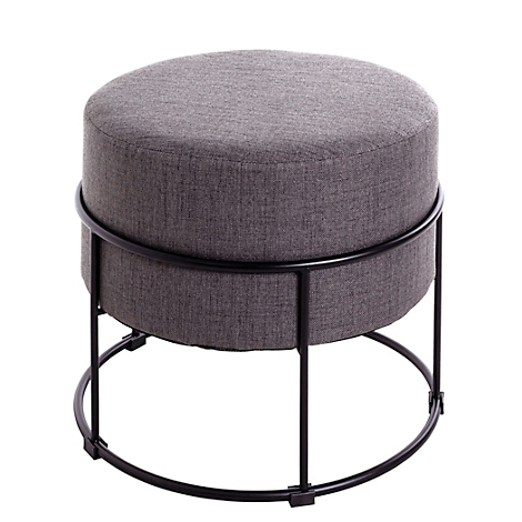 Ronde kruk met grijze stoffen bekleding en zwart metalen frame.