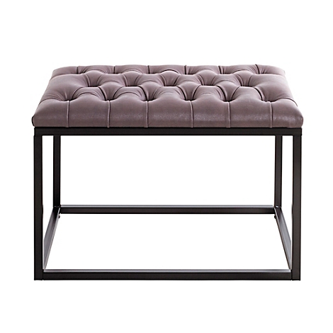 Vierkante hocker met gecapitonneerde, taupekleurige bovenkant en zwart metalen frame.