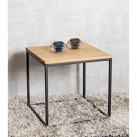 Table carrée en bois avec dessus brun clair et cadre en métal noir.