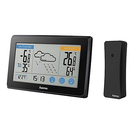 Ensemble station météo noir avec écran et émetteur. L'écran affiche la température intérieure et extérieure ainsi que l'humidité, y compris la date et l'heure. L'émetteur se trouve à côté.