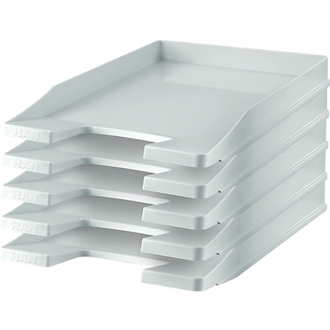 Stack of white, rectangular document trays stacked on top of each other.