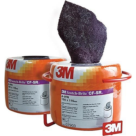 Two orange containers with a purple cleaning pad, featuring 3M Scotch-Brite.
