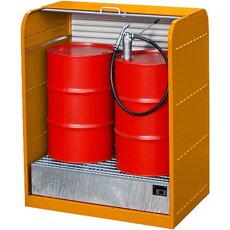 Yellow drum storage with two red barrels and a pump. The barrels are on a grate. A lid is open.