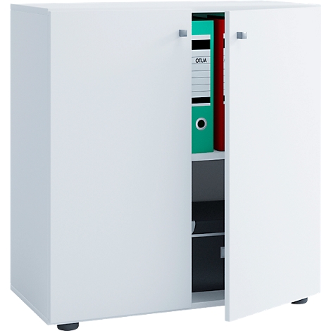 White cabinet with open door, in which folders are standing. The handle is angular and metallic.