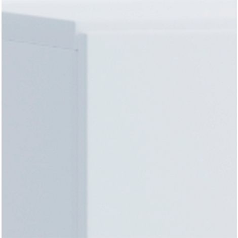 Corner of a white wall with part of a light grey door or cabinet. The right half of the image is white.