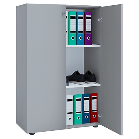 Gray cabinet with open door. Inside, file folders in various colors and shoes on the shelves.